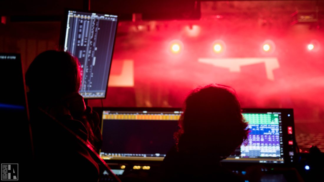 Crew at the control screens during a show